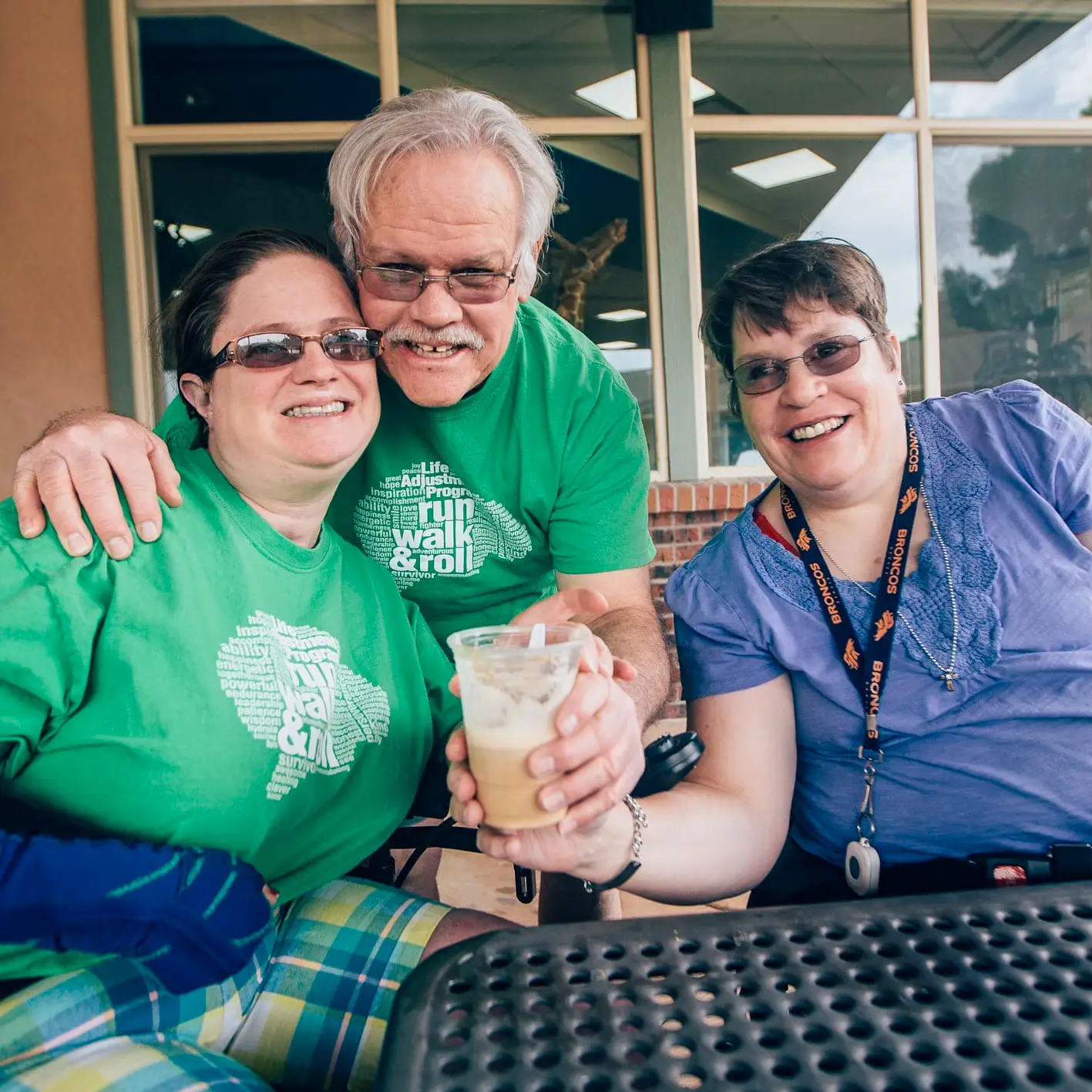 Photo of residents with a staff member