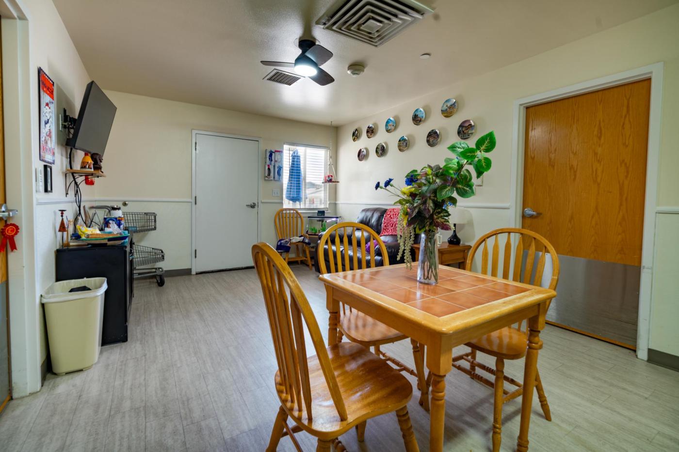 Dining room and kitchen of apartment unit