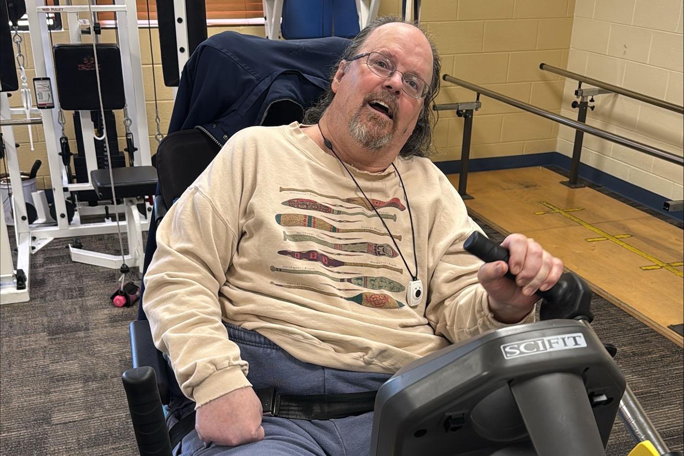 Male resident in fitness center